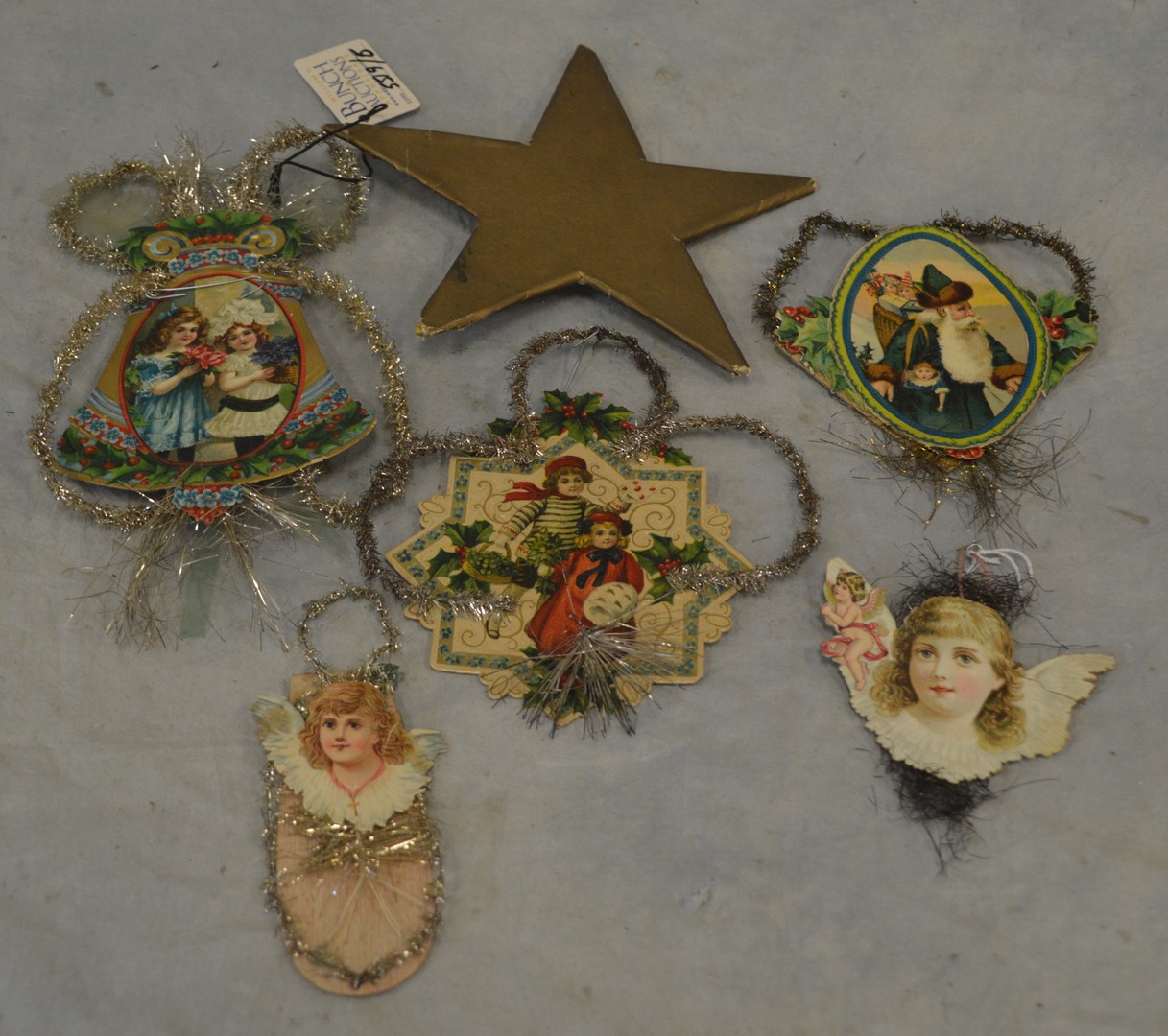 Appraisal: Vintage Christmas ornaments scrap children Santa cardboard star RCA LLC