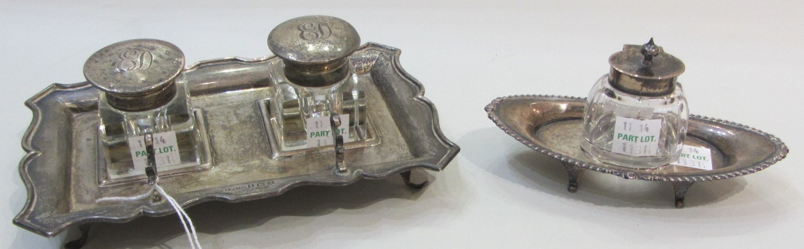 Appraisal: A silver shaped rectangular inkstand fitted with two silver topped