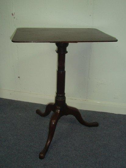 Appraisal: An oak tripod table cm wide