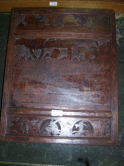 Appraisal: A th Century carved panel with pen and ink work