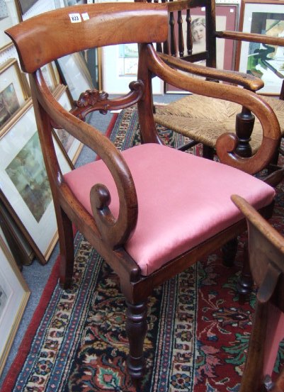 Appraisal: A set of four mid th century mahogany dining chairs