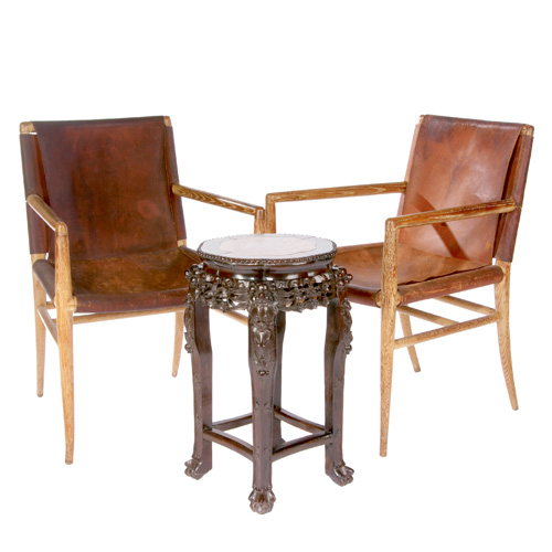 Appraisal: STYLE OF T H ROBSJOHN-GIBBINGS Pair of wood and leather