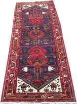 Appraisal: A Sarouq Runner circa th Century Central navy field features