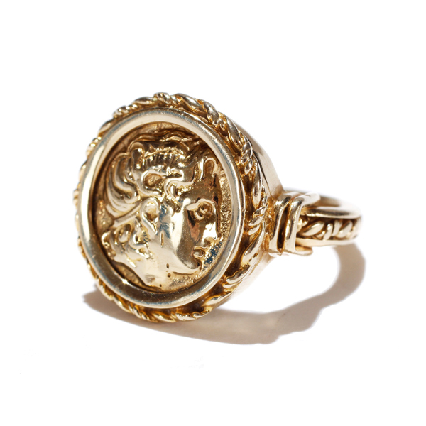 Appraisal: Gold K fashion ring with cameo coin design medallion g