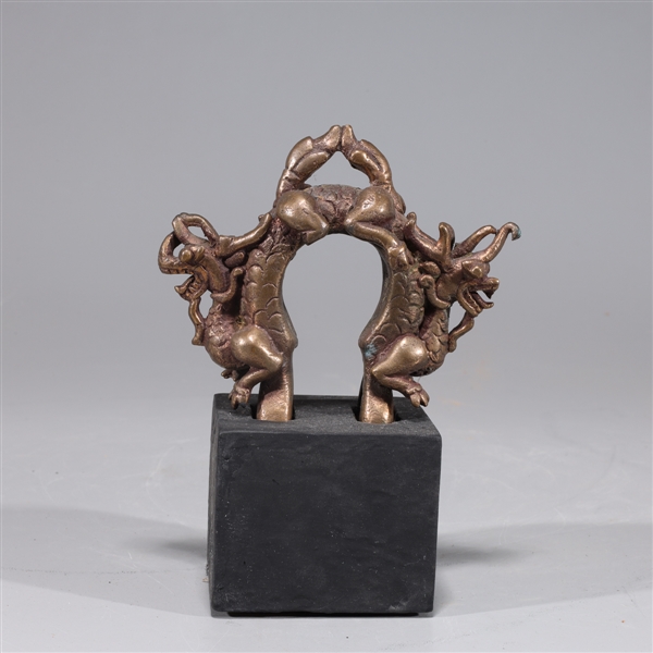 Appraisal: th century antique Burmese bronze bell bracket featuring ornate dragons