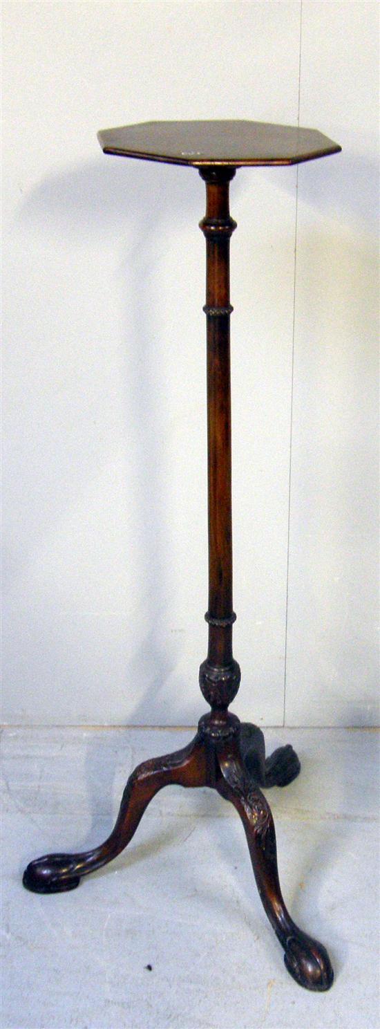 Appraisal: th century octagonal mahogany torchere on turned tapering column and