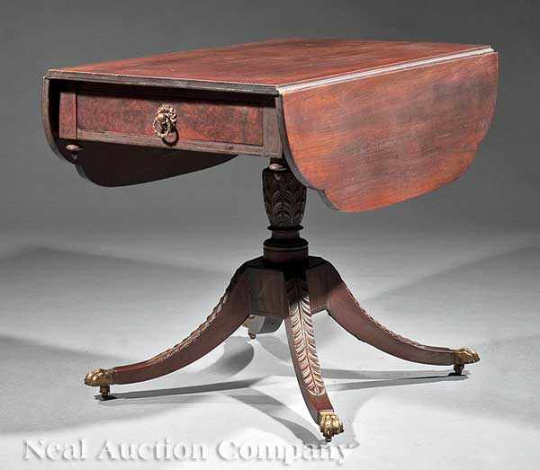 Appraisal: An American Classical Carved Mahogany and Brass Inlaid Drop-Leaf Table