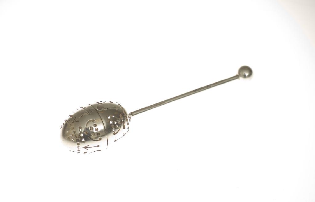 Appraisal: LATE VICTORIAN SILVER TEA INFUSER ATKIN BROTHERS SHEFFIELD the egg-shaped