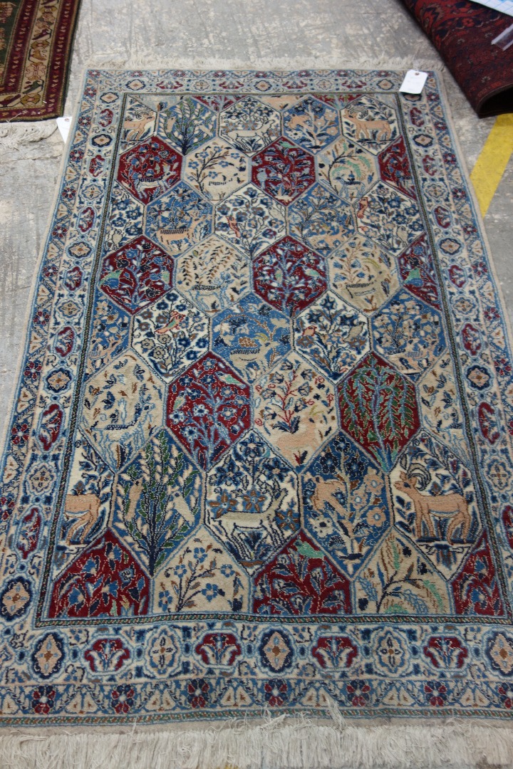 Appraisal: An Esfahan part silk rug Persian the tile field with