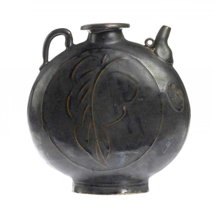 Appraisal: A CHINESE BLACK GLAZED EWER of circular form with squat