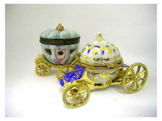 Appraisal: Lot of two Limoges hinged porcelain boxes including Cinderella's carriage