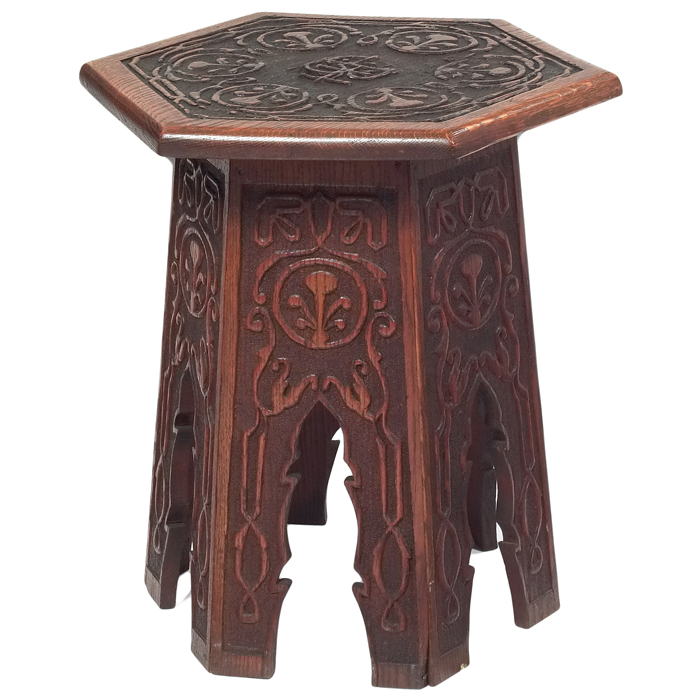 Appraisal: Arts and Crafts tabouret hexagonal form with carved organic design