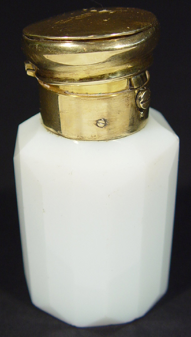 Appraisal: Cut glass scent bottle with gilt mount and hinged lid