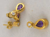 Appraisal: A yellow metal tests carat gold amethyst and diamond pendant