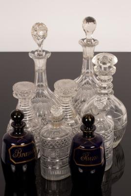 Appraisal: A pair of Regency cut glass half-decanters of strawberry cut