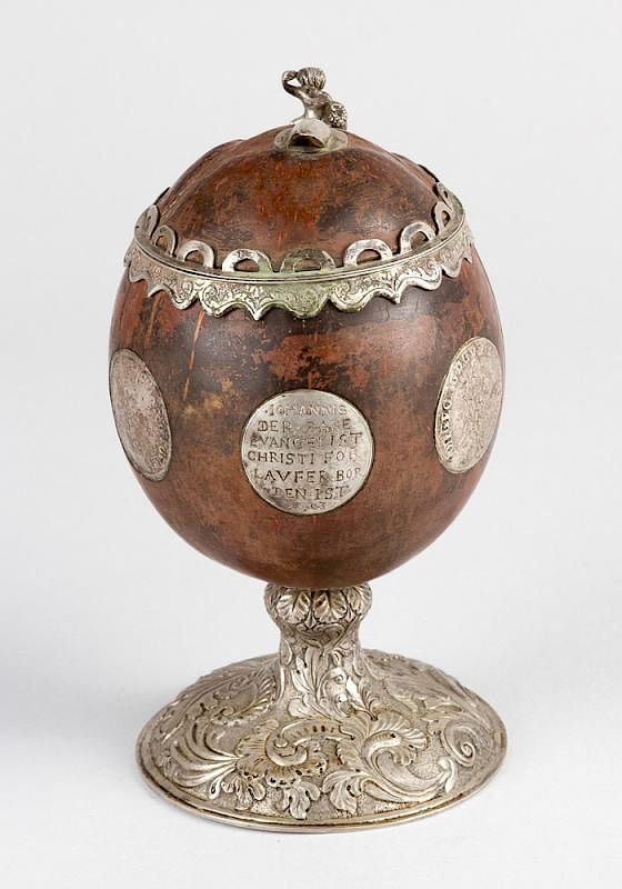 Appraisal: Coconut goblet Coconut goblet with rich silver mounts and coins