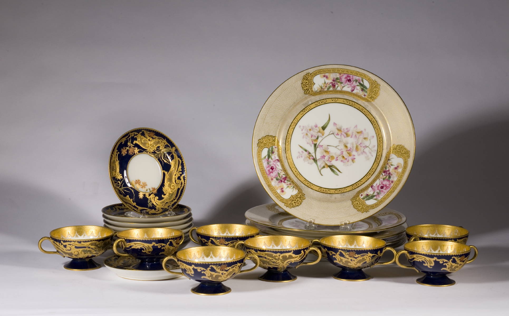 Appraisal: FIVE LIMOGE FLORAL DECORATED SERVICE PLATES AND EIGHT BLUE AND