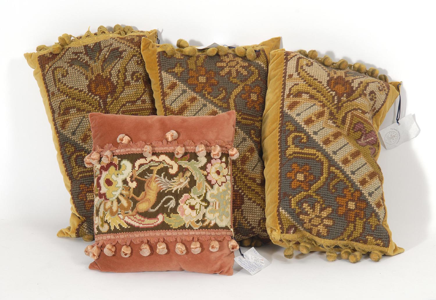 Appraisal: FOUR DESIGNER PILLOWS made mostly of rug fragments ConditionGood