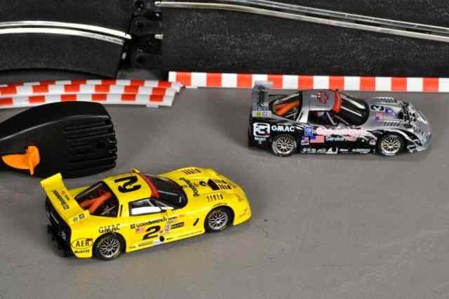 Appraisal: BOXES SCALETRIC SLOT CAR EXTRA TRACKIncluding two cars one silver