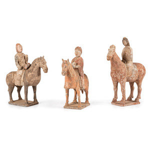 Appraisal: Three Chinese Equestrian Figures each with remnants of polychrome decoration