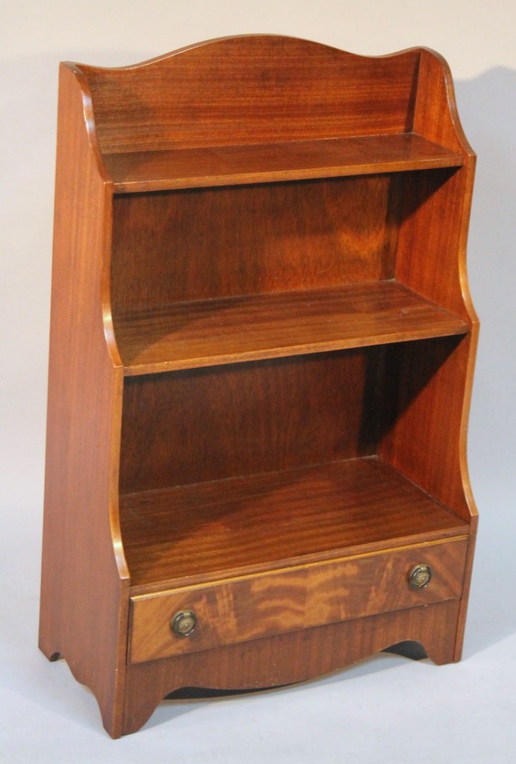 Appraisal: A thC mahogany waterfall bookcase of small proportion with three