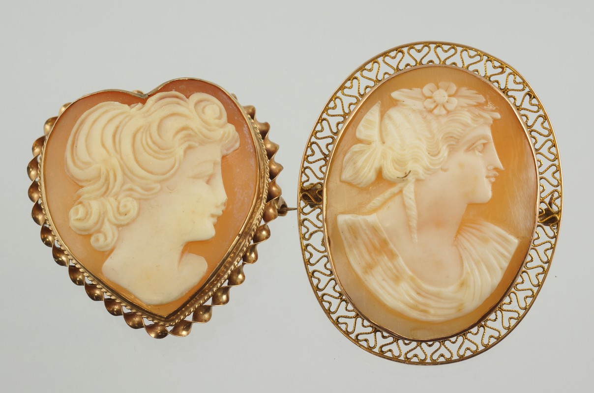 Appraisal: oval K YG carved shell cameo portrait pins one heart