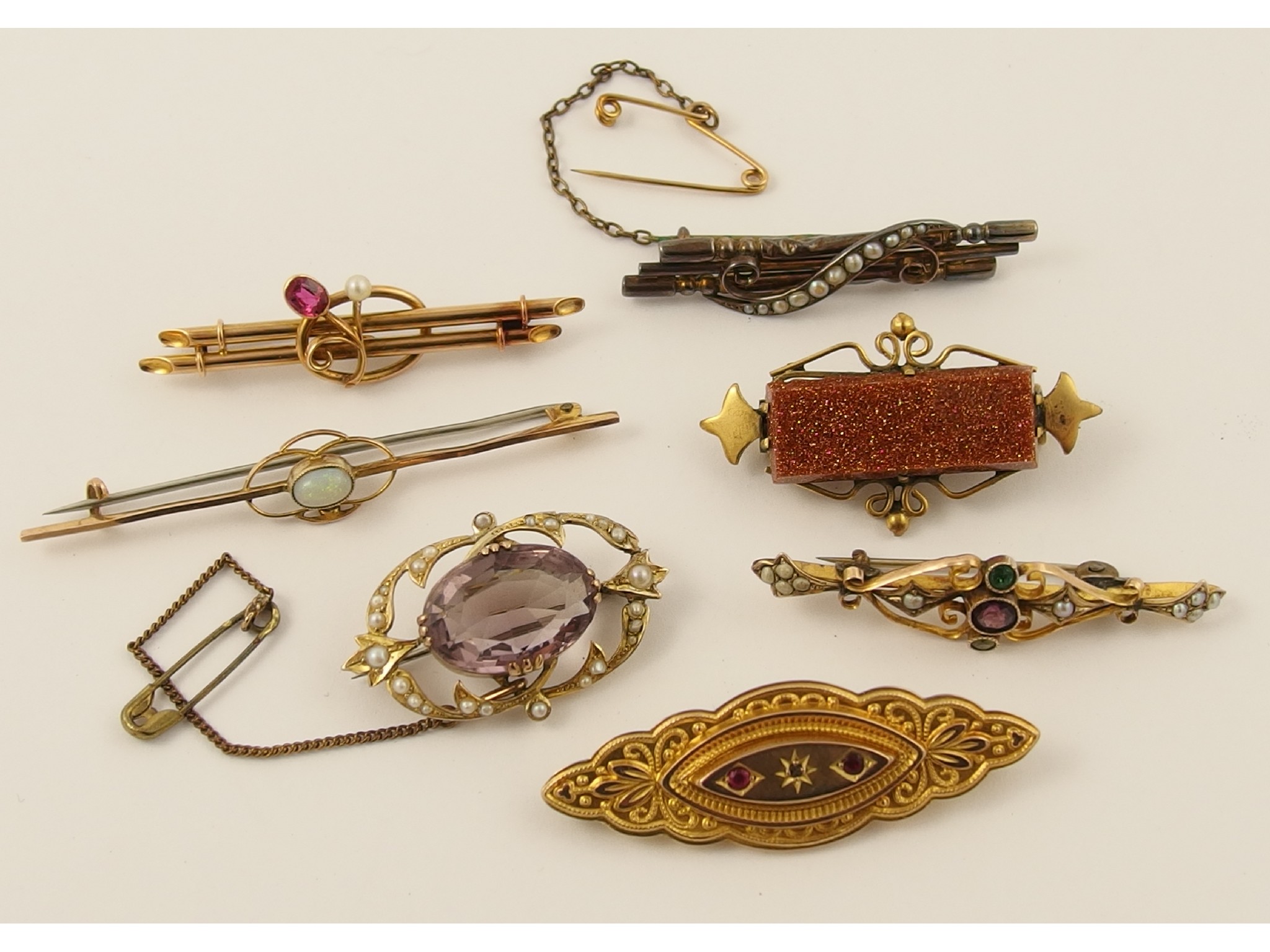 Appraisal: A collection of Victorian and Edwardian gem set brooches in