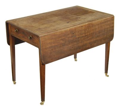 Appraisal: A George III mahogany Pembroke table with a frieze drawer