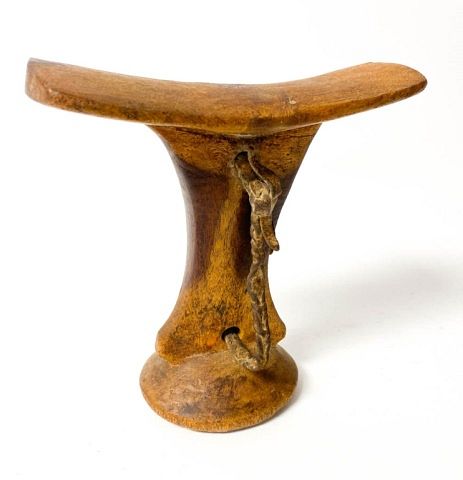 Appraisal: Turkana East African Headrest Carved wood and hide handles Scratches