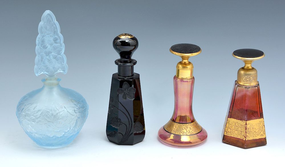 Appraisal: Grouping of four art glass perfume bottles Grouping of four