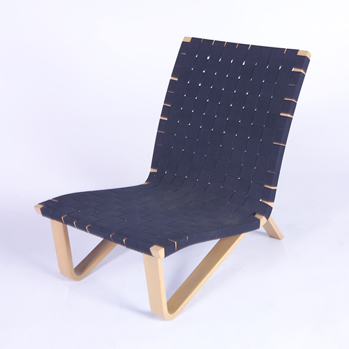 Appraisal: CLIFFORD PASCOE Armless lounge chair with black cotton webbing on