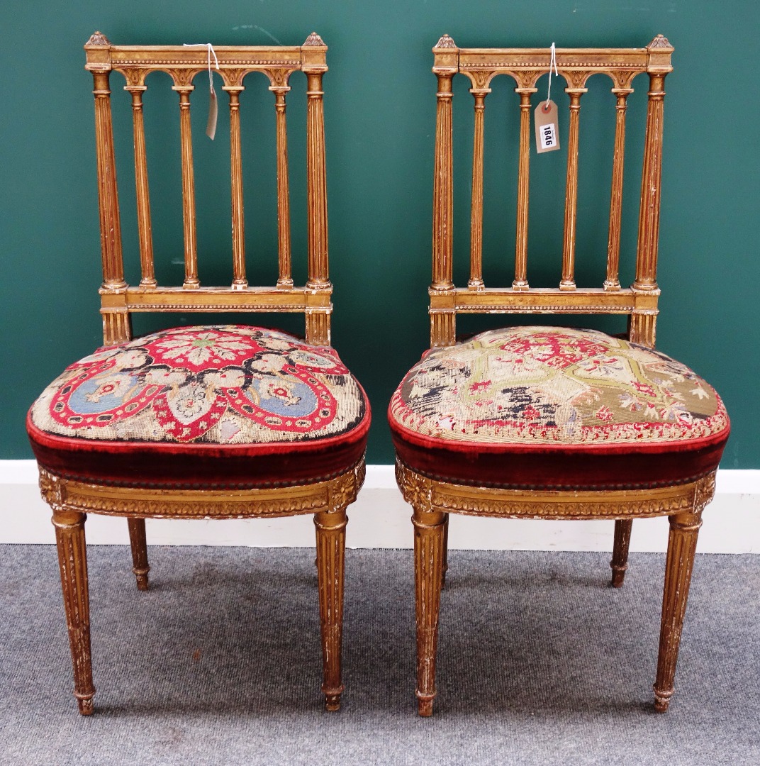 Appraisal: A pair of th century gilt framed side chairs with