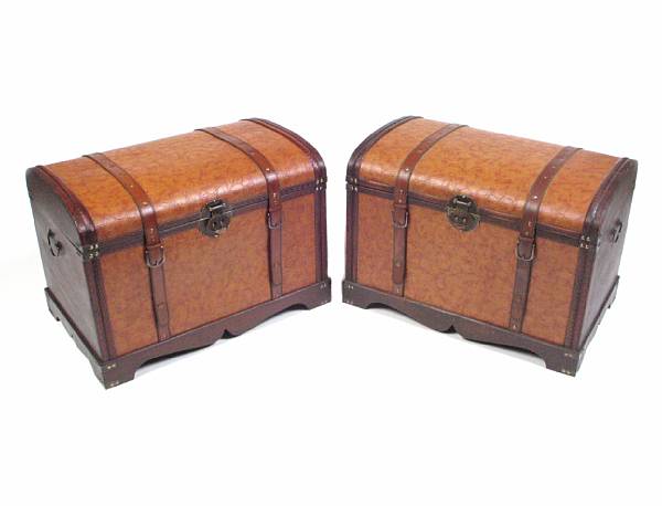 Appraisal: A pair of wood and leather trunks height in width