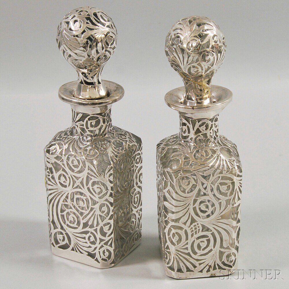 Appraisal: Pair of Silver Overlay Cologne Bottles late th early th