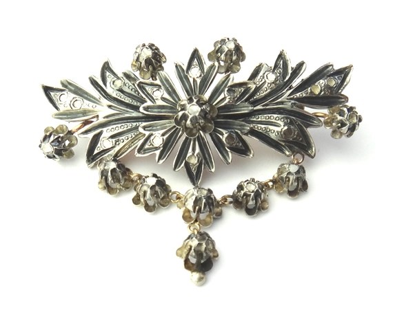 Appraisal: A diamond set brooch probably Maltese in a panel shaped