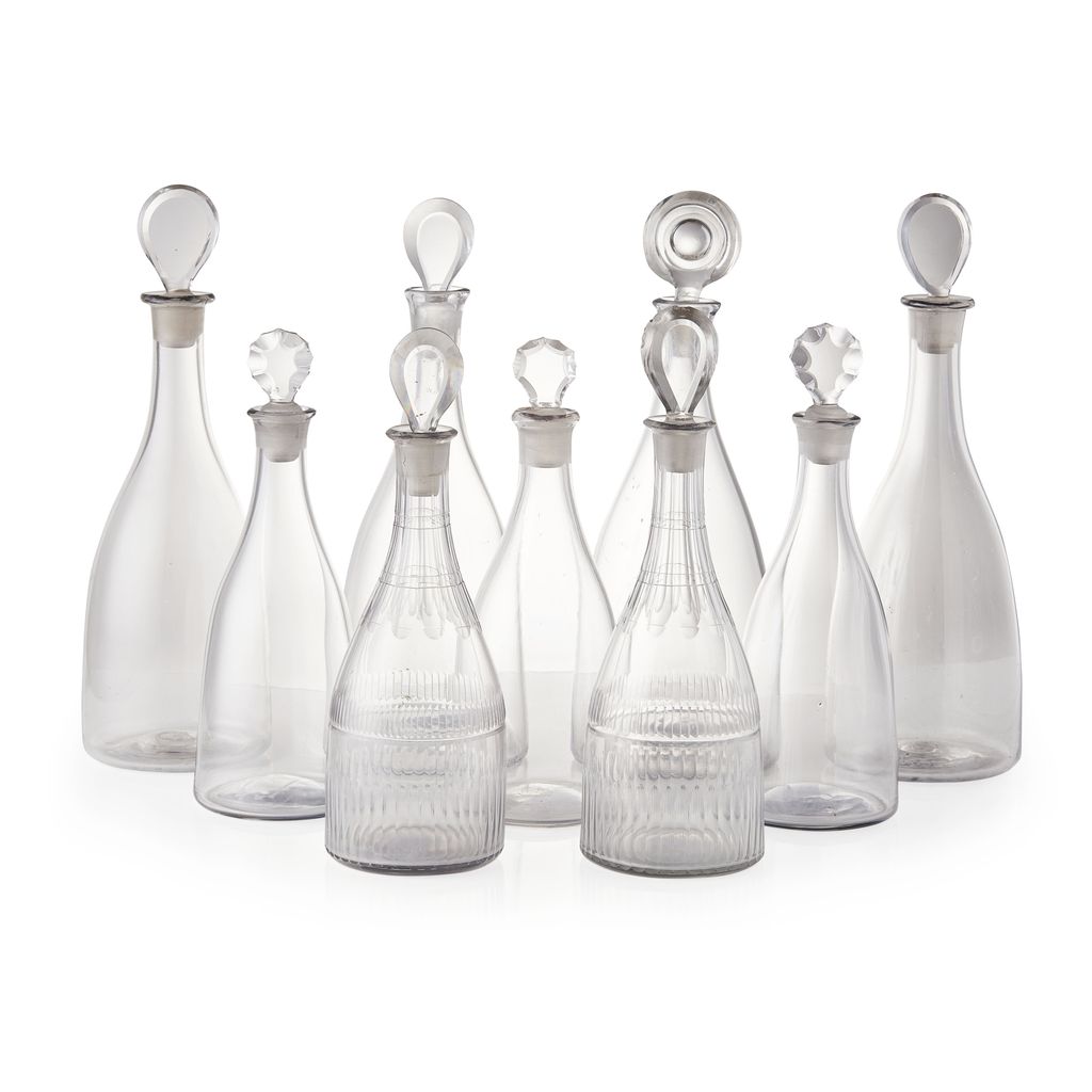 Appraisal: GROUP OF MATCHED DECANTERS AND STOPPERS TH CENTURY comprising seven