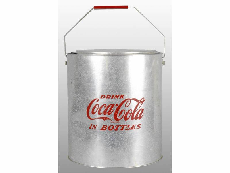 Appraisal: Unusual -Gallon Coca-Cola Round-Style Cooler Description Original box Textured aluminum