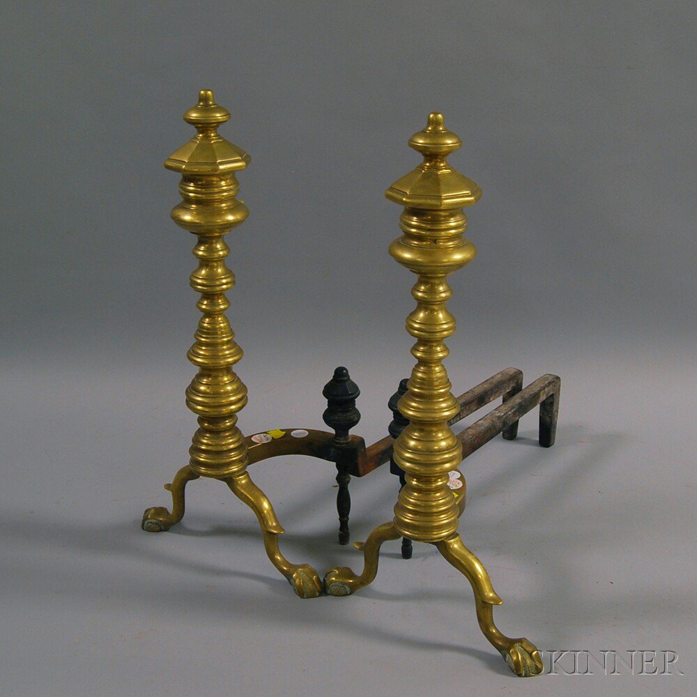 Appraisal: Pair of Brass and Iron Ring-turned Andirons th century the