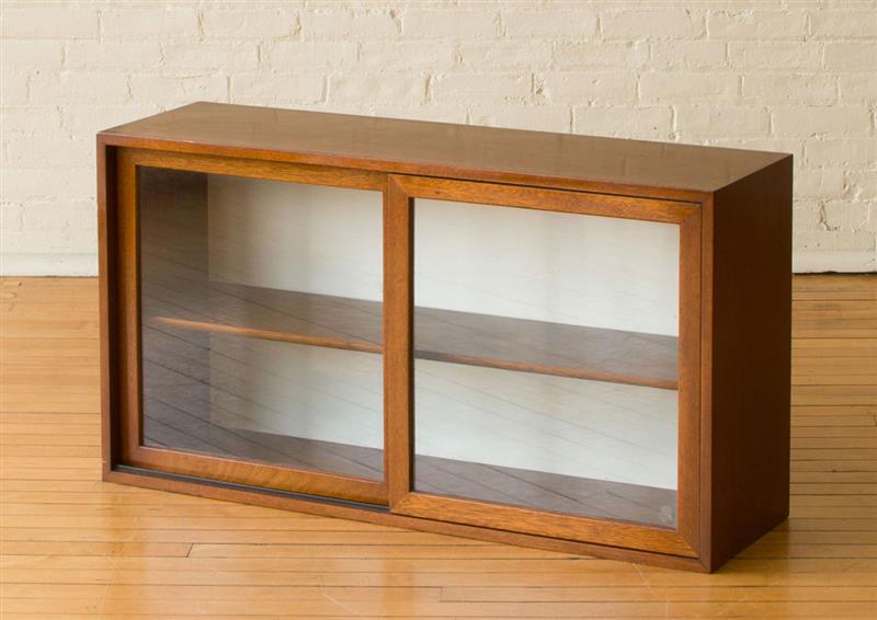 Appraisal: HARVEY PROVER MAHOGANY SLIDING DOOR CABINET x x in Estimate