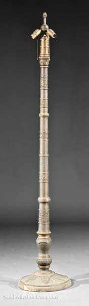 Appraisal: An Asian Bronze Standing Lamp cylindrical shaft relief banded with