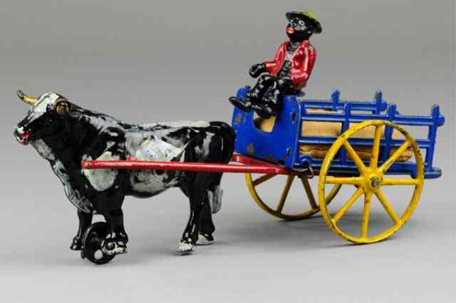 Appraisal: HUBLEY OXEN CART Cast iron and pressed steel paint in