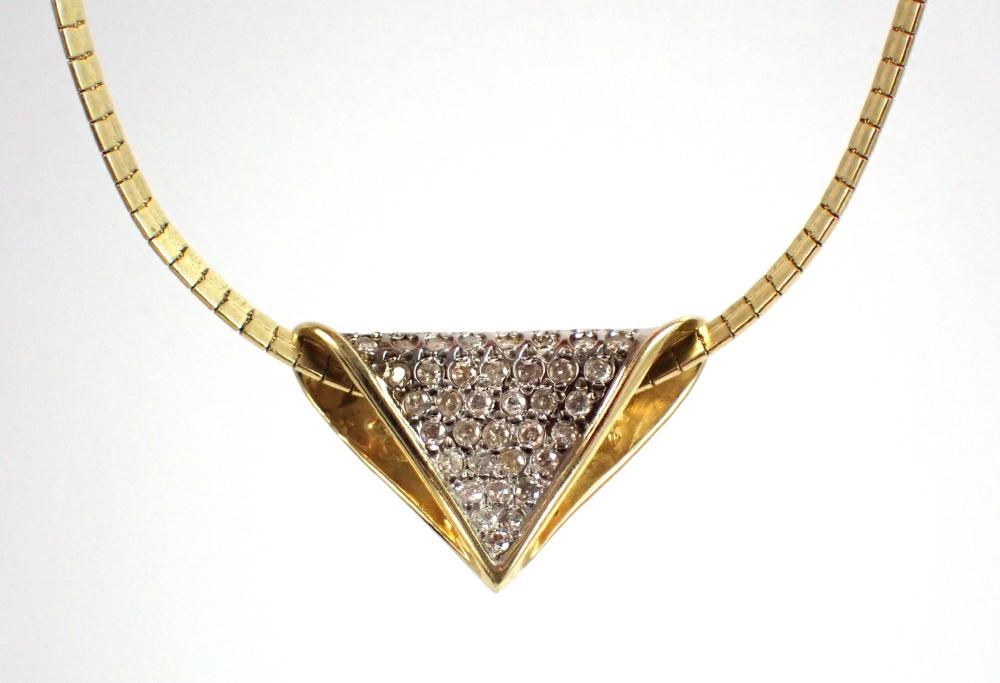 Appraisal: DIAMOND AND FOURTEEN KARAT GOLD SLIDE PENDANT NECKLACE with a