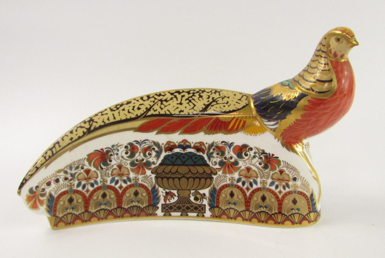 Appraisal: A Royal Crown Derby Imari paperweight modelled as the Golden