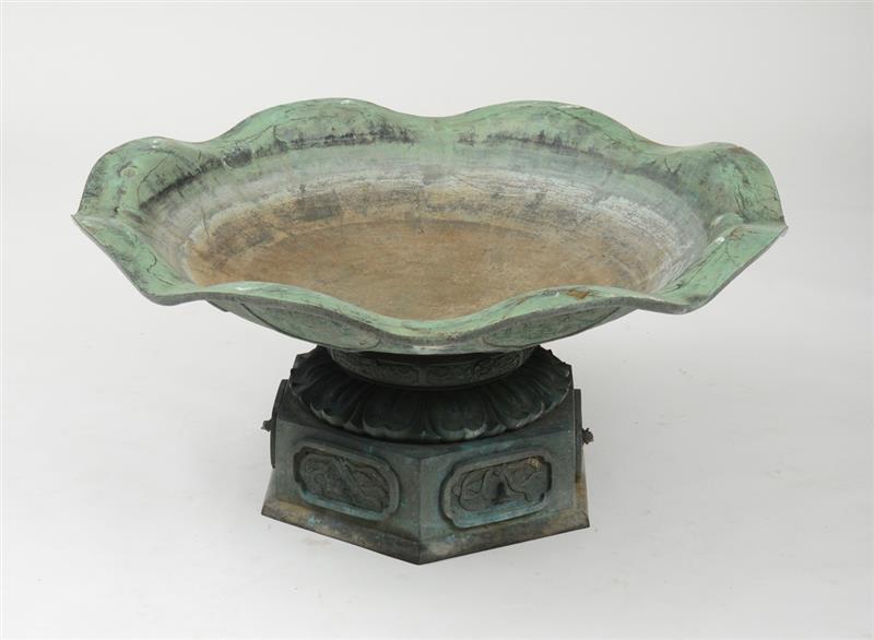 Appraisal: CHINESE BRONZE LOTUS-FORM GARDEN BATH The bowl raised on a