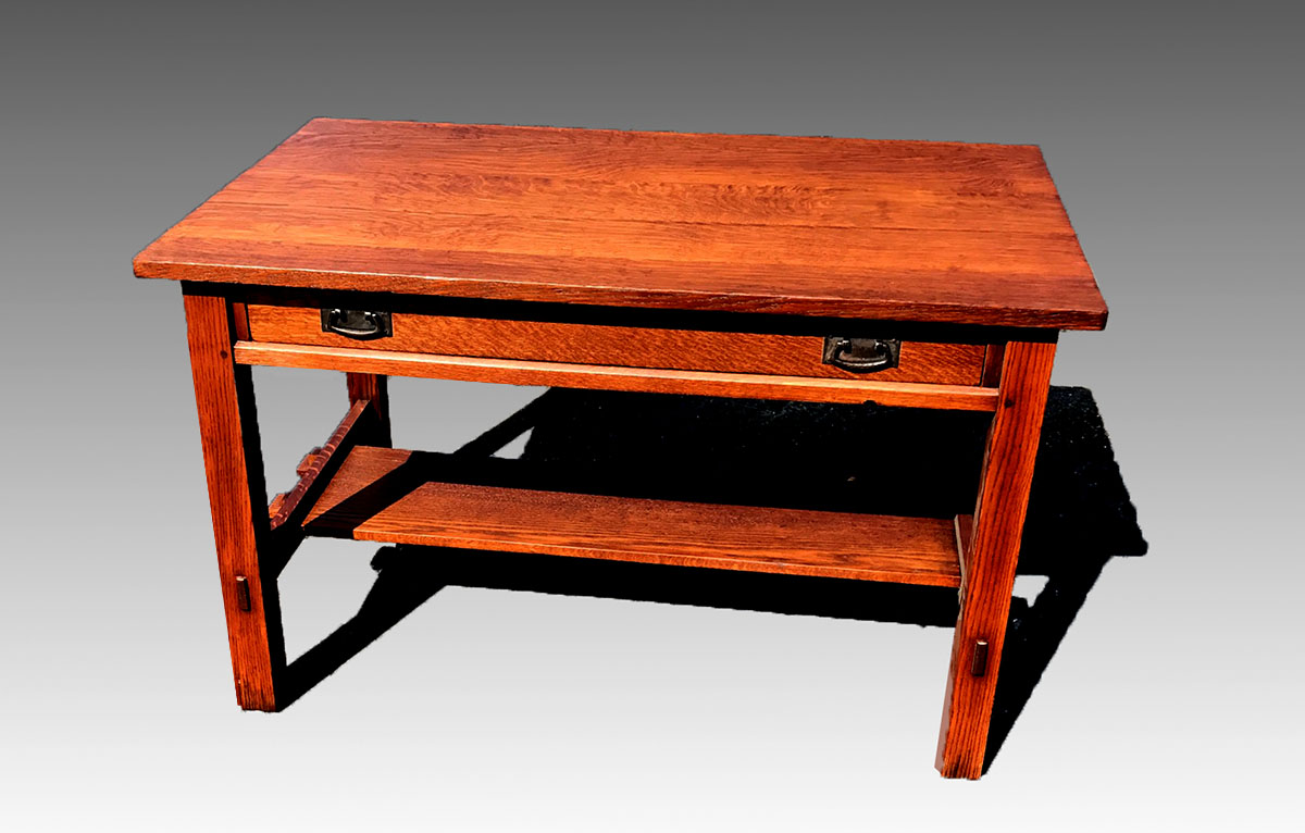 Appraisal: MISSION OAK ARTS CRAFTS LIBRARY TABLE In the style of