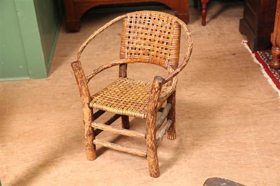 Appraisal: CHILD'S SIZE BENTWOOD CHAIR Rustic hoop back chair with wicker