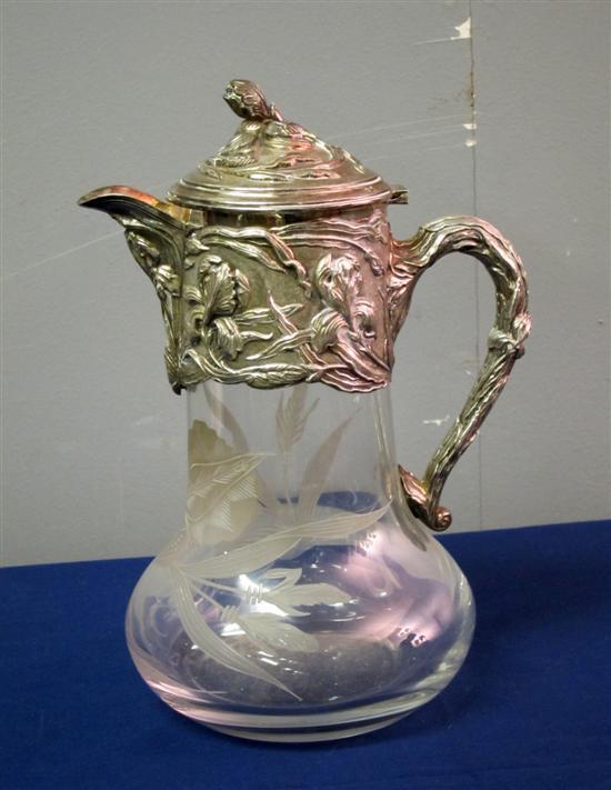 Appraisal: Art Nouveau continental silver mounted claret jug with hinged cover