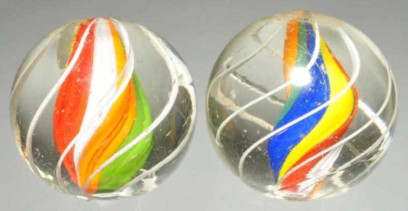 Appraisal: Lot of English Divided Core Swirl Marbles Description Same cane