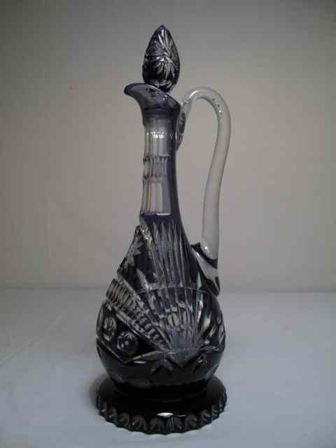 Appraisal: A Czech cut to clear crystal decanter in amethyst Beautiful