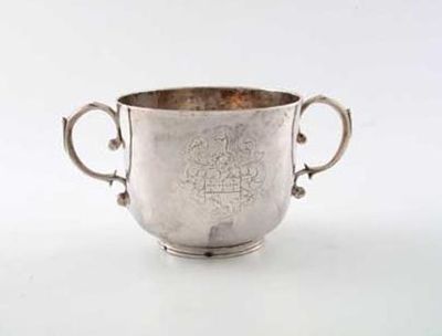 Appraisal: A James II porringer with two cast s-scroll handles and